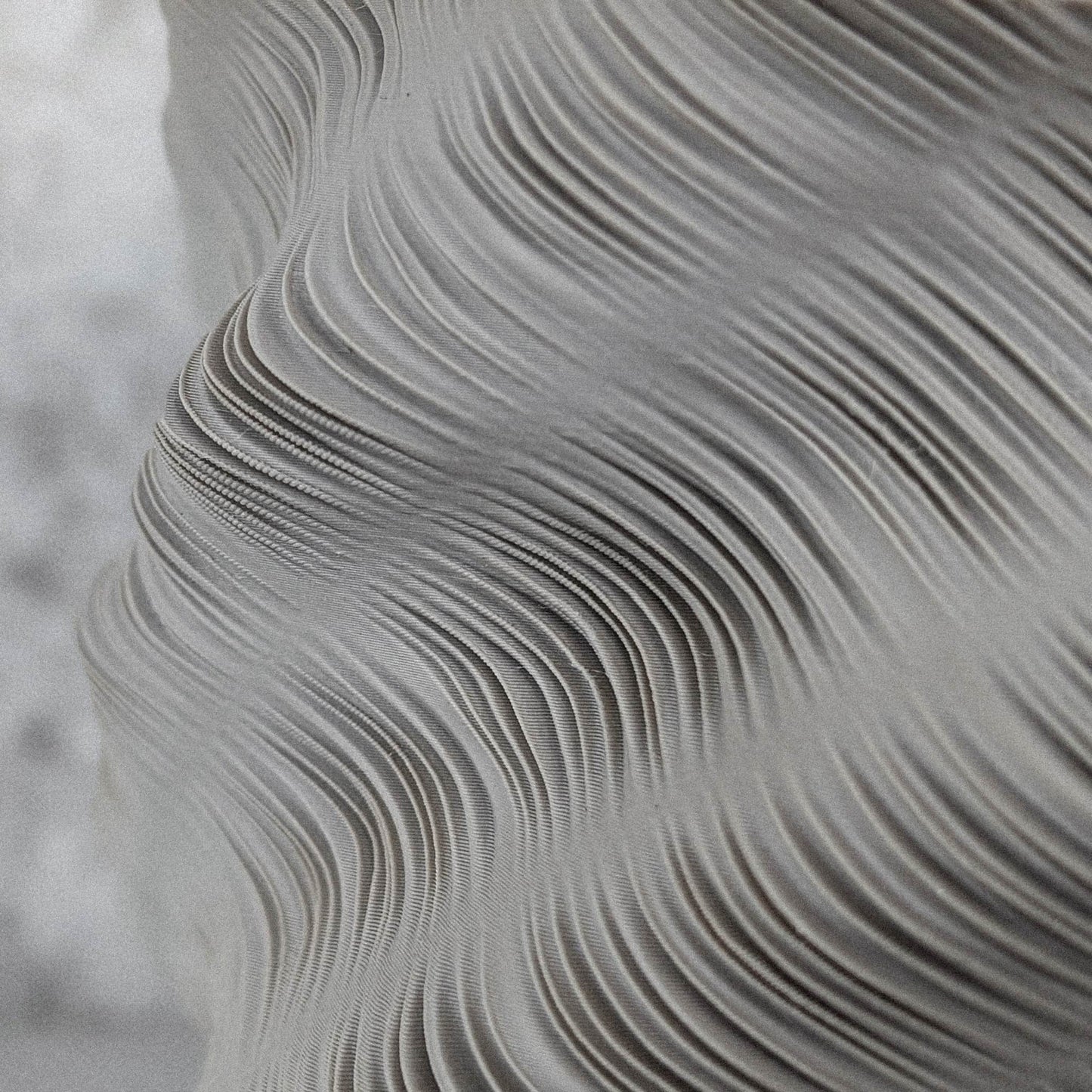 Close-up of layered strata on Calisia sustainable 3D printed vase