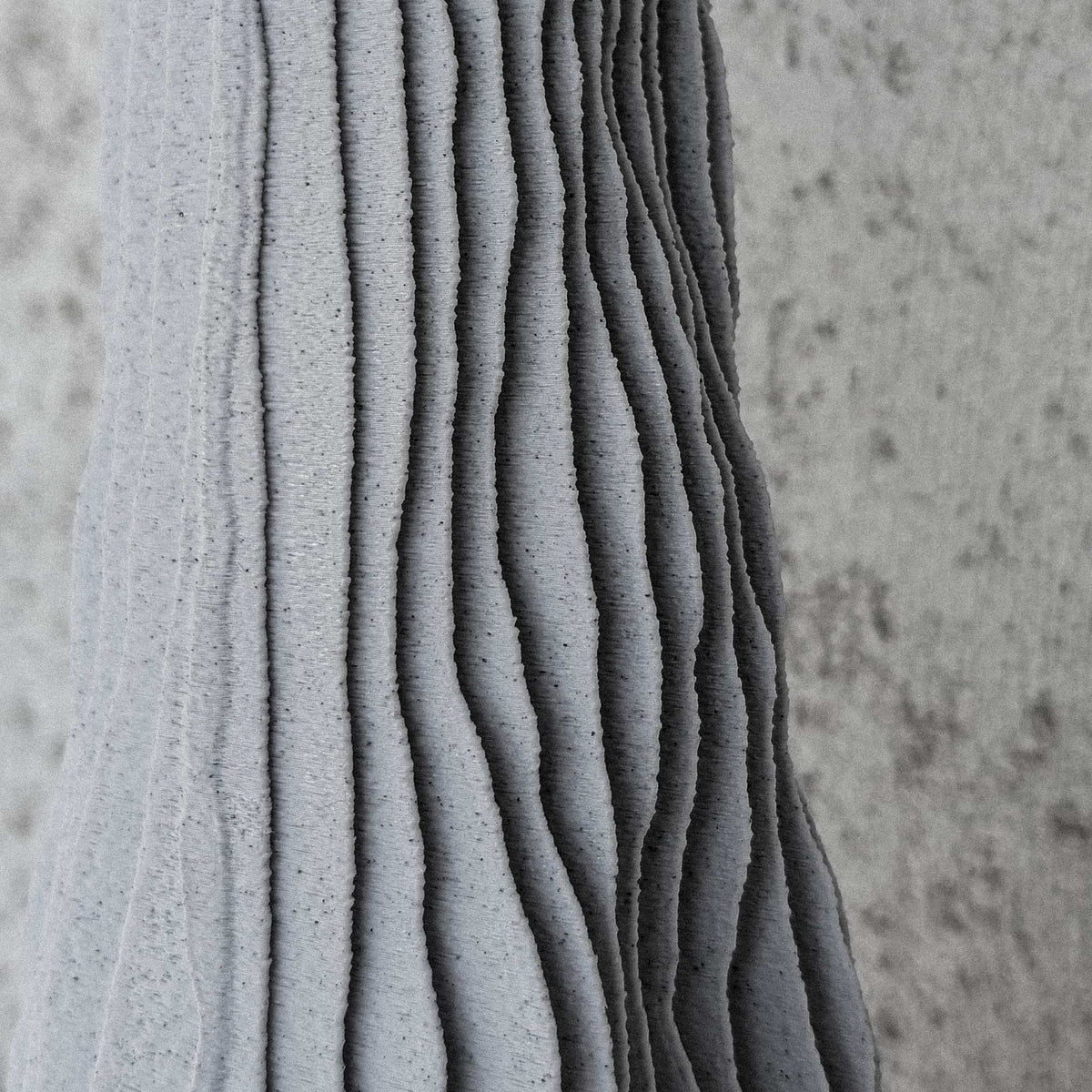 sustainable 3d printed vase CARSIA texture detail highlighting layered karst surface in marble PLA